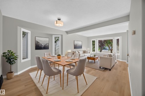 Light wood-finish flooring throughout, bright walls, and recessed lighting - 3640 31 Street Nw, Edmonton, AB - Indoor Photo Showing Dining Room