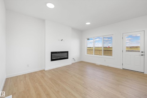 8616 183 Avenue Nw, Edmonton, AB - Indoor Photo Showing Living Room With Fireplace