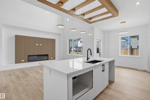 24 Munn Way, Leduc, AB - Indoor Photo Showing Kitchen With Double Sink