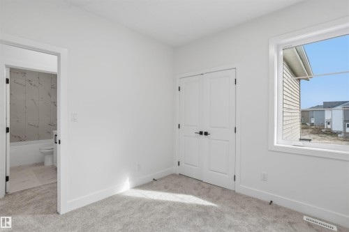 24 Munn Way, Leduc, AB - Indoor Photo Showing Other Room