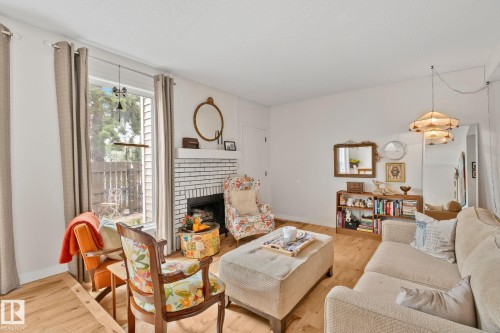 622 Saddleback Road Nw, Edmonton, AB - Indoor Photo Showing Living Room With Fireplace
