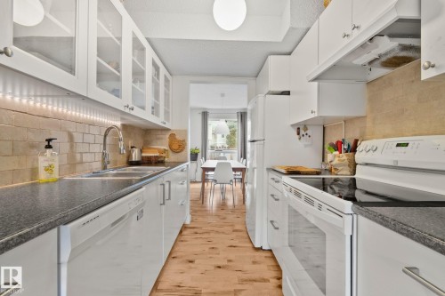 622 Saddleback Road Nw, Edmonton, AB - Indoor Photo Showing Kitchen With Double Sink
