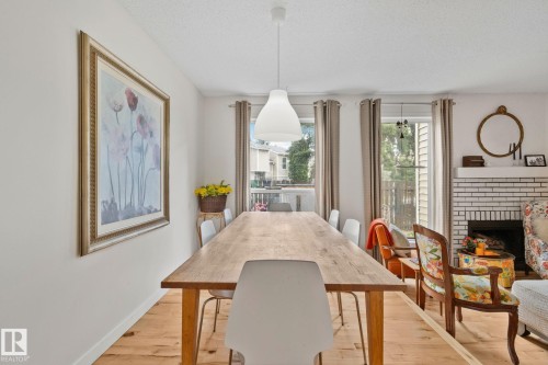622 Saddleback Road Nw, Edmonton, AB - Indoor Photo Showing Dining Room With Fireplace