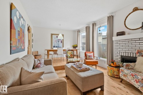 622 Saddleback Road Nw, Edmonton, AB - Indoor Photo Showing Living Room With Fireplace
