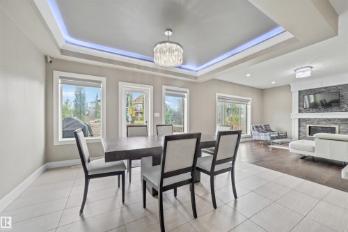 1960 Adamson Terrace Sw, Edmonton, AB - Indoor Photo Showing Dining Room With Fireplace
