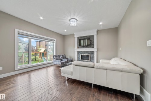 1960 Adamson Terrace Sw, Edmonton, AB - Indoor Photo Showing Living Room With Fireplace