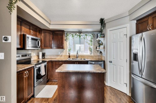 5608 Stevens Crescent Nw, Edmonton, AB - Indoor Photo Showing Kitchen With Double Sink