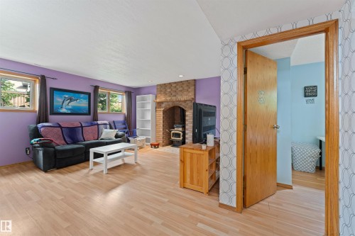 16724 88 St Nw, Edmonton, AB - Indoor Photo Showing Living Room With Fireplace