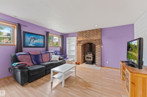 16724 88 St Nw, Edmonton, AB - Indoor Photo Showing Living Room With Fireplace