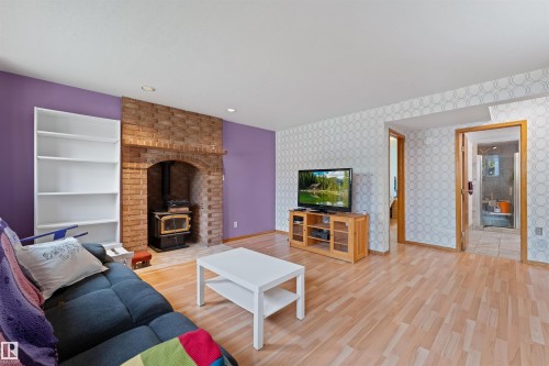 16724 88 St Nw, Edmonton, AB - Indoor Photo Showing Living Room With Fireplace