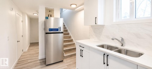 12916 123A Street Nw, Edmonton, AB - Indoor Photo Showing Kitchen With Double Sink