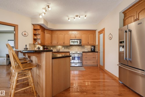 #301 9819 96A St Nw, Edmonton, AB - Indoor Photo Showing Kitchen With Stainless Steel Kitchen