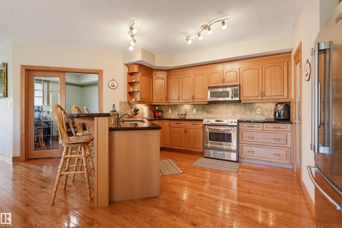 #301 9819 96A St Nw, Edmonton, AB - Indoor Photo Showing Kitchen With Stainless Steel Kitchen