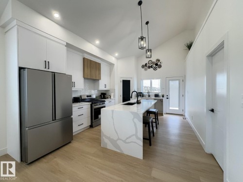 8903 Mayday Way Sw, Edmonton, AB - Indoor Photo Showing Kitchen With Upgraded Kitchen