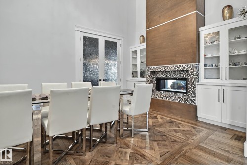 3652 Westcliff Way Sw, Edmonton, AB - Indoor Photo Showing Dining Room With Fireplace