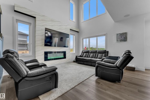 5228 169 Ave Nw Nw, Edmonton, AB - Indoor Photo Showing Living Room With Fireplace