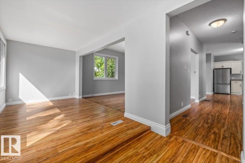 Wood-finish flooring throughout - 11429 64 Street Nw, Edmonton, AB - Indoor