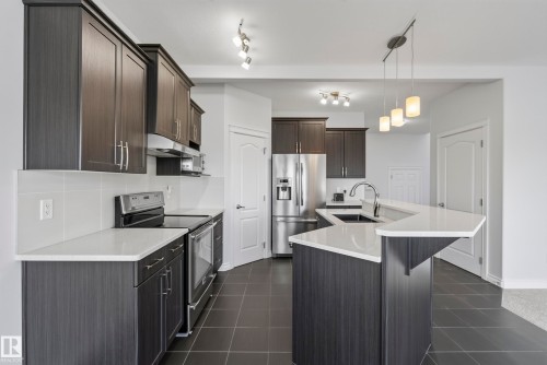 15852 10 Avenue Sw, Edmonton, AB - Indoor Photo Showing Kitchen With Upgraded Kitchen