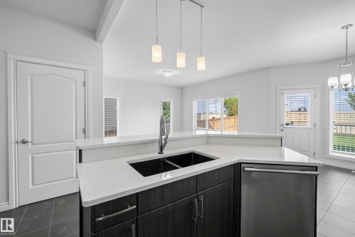 15852 10 Avenue Sw, Edmonton, AB - Indoor Photo Showing Kitchen With Double Sink