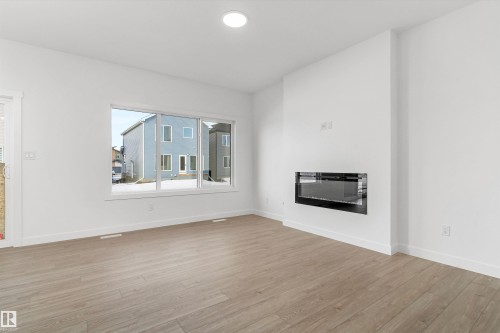 2812 190 Street Nw, Edmonton, AB - Indoor Photo Showing Living Room With Fireplace