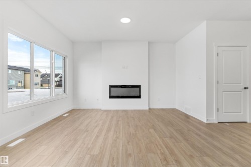 2812 190 Street Nw, Edmonton, AB - Indoor Photo Showing Living Room With Fireplace
