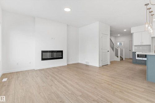 2812 190 Street Nw, Edmonton, AB - Indoor Photo Showing Other Room With Fireplace