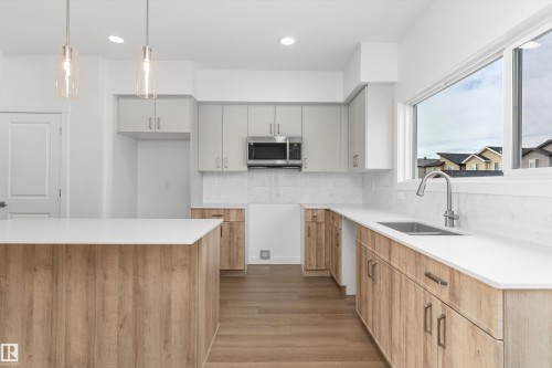 1012 14 Avenue Nw, Edmonton, AB - Indoor Photo Showing Kitchen With Double Sink With Upgraded Kitchen