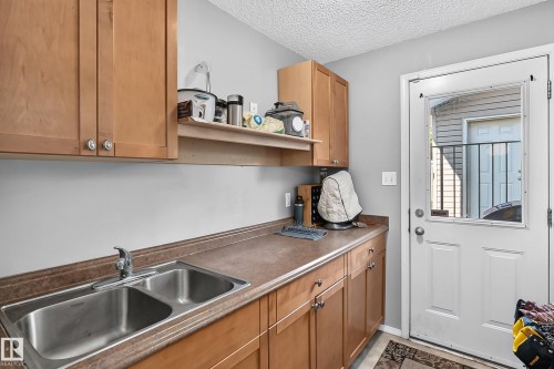 322 84 Street Sw, Edmonton, AB - Indoor Photo Showing Kitchen With Double Sink