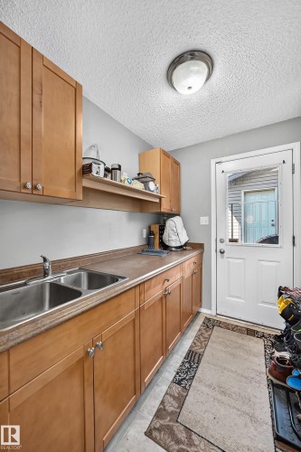 322 84 Street Sw, Edmonton, AB - Indoor Photo Showing Kitchen With Double Sink