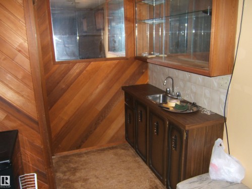 Wood paneling with diagonal orientation - 5404 49 Street, Two Hills, AB - Indoor