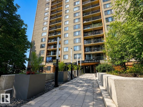 Brick facade high-rise building with individual balconies - #301 9808 103 St Nw, Edmonton, AB - Outdoor With Balcony With Facade