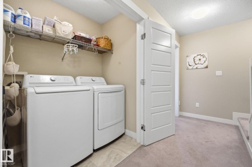 914 Valour Way Nw, Edmonton, AB - Indoor Photo Showing Laundry Room