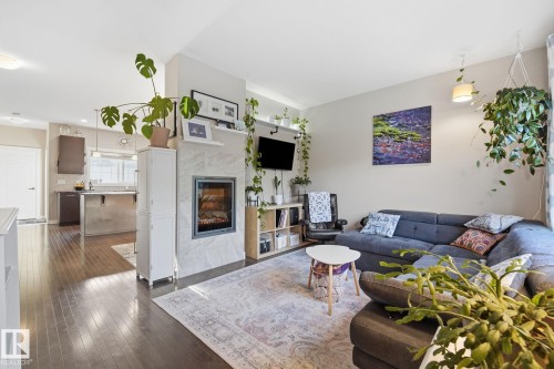 914 Valour Way Nw, Edmonton, AB - Indoor Photo Showing Living Room With Fireplace