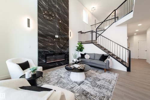 33 Sun Meadows Cl, Stony Plain, AB - Indoor Photo Showing Living Room With Fireplace