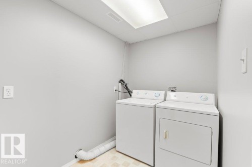 Dedicated laundry area featuring a washer and dryer - 21344 88 Avenue Nw, Edmonton, AB - Indoor Photo Showing Laundry Room