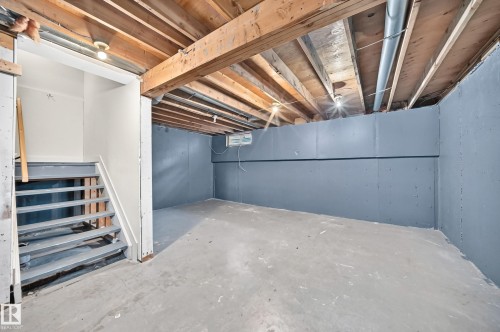 Exposed ceiling joists with visible electrical conduits and plumbing - 6416 180 Street Nw, Edmonton, AB 