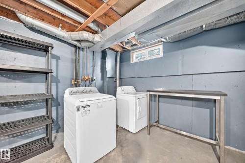 Concrete flooring, exposed ceiling joists, and a window - 6416 180 Street Nw, Edmonton, AB 
