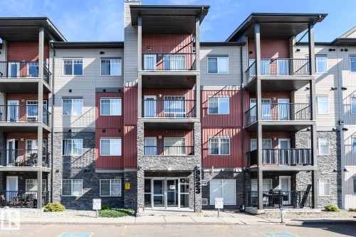 #110 9523 160 Av Nw, Edmonton, AB - Outdoor With Balcony With Facade