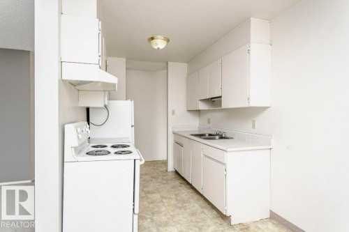 #71 11255 31 Av Nw, Edmonton, AB - Indoor Photo Showing Kitchen With Double Sink