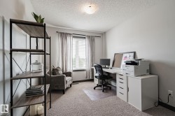 Recessed window with blinds and drapes, wall-to-wall carpeting, and a ceiling-mounted light fixture - 