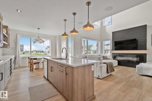 1 Starling Way, Fort Saskatchewan, AB - Indoor Photo Showing Kitchen With Fireplace With Upgraded Kitchen