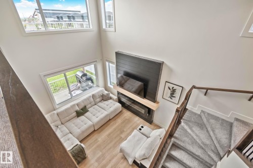 1 Starling Way, Fort Saskatchewan, AB - Indoor Photo Showing Other Room With Fireplace