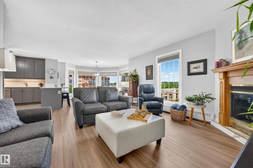 #405 3 Perron St, St. Albert, AB - Indoor Photo Showing Living Room With Fireplace