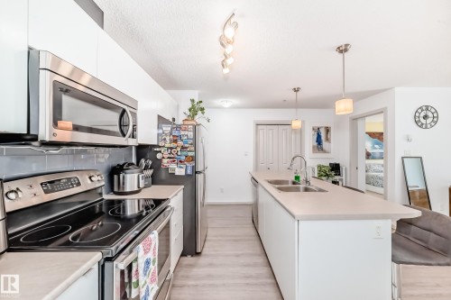 148-348 Windermere Road Nw, Edmonton, AB - Indoor Photo Showing Kitchen With Double Sink