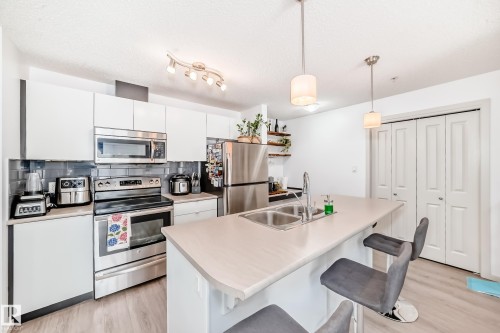 148-348 Windermere Road Nw, Edmonton, AB - Indoor Photo Showing Kitchen With Double Sink