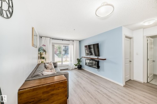 148-348 Windermere Road Nw, Edmonton, AB - Indoor Photo Showing Living Room