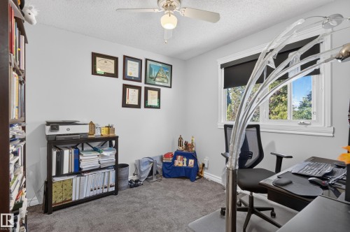 Wall-to-wall carpeting and white walls with a ceiling fan - 8632 184 Street Nw, Edmonton, AB - Indoor