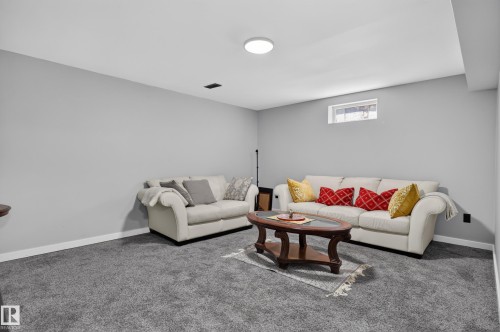 Recessed window, overhead flush-mount lighting, and wall-to-wall carpeting - 8632 184 Street Nw, Edmonton, AB - Indoor