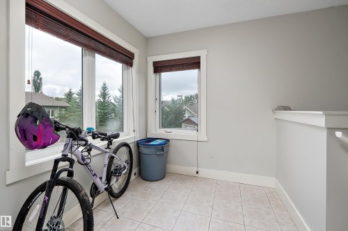 Tile flooring and multiple windows with blinds - 203 Graybriar Green, Stony Plain, AB - Indoor Photo Showing Other Room