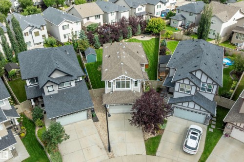 Spacious cul-de-sac property with extensive paved driveways and attached garages - 3922 Agar Court Sw, Edmonton, AB - Outdoor
